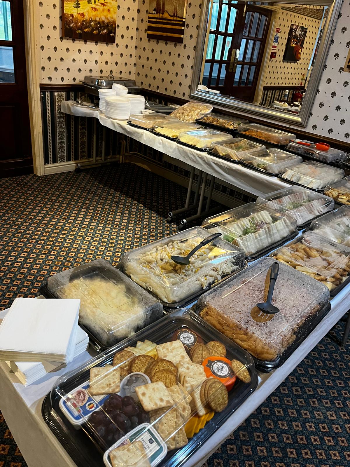 Perfect Platter Liverpool — full buffet spread in a traditional wallpapered venue with cheese board